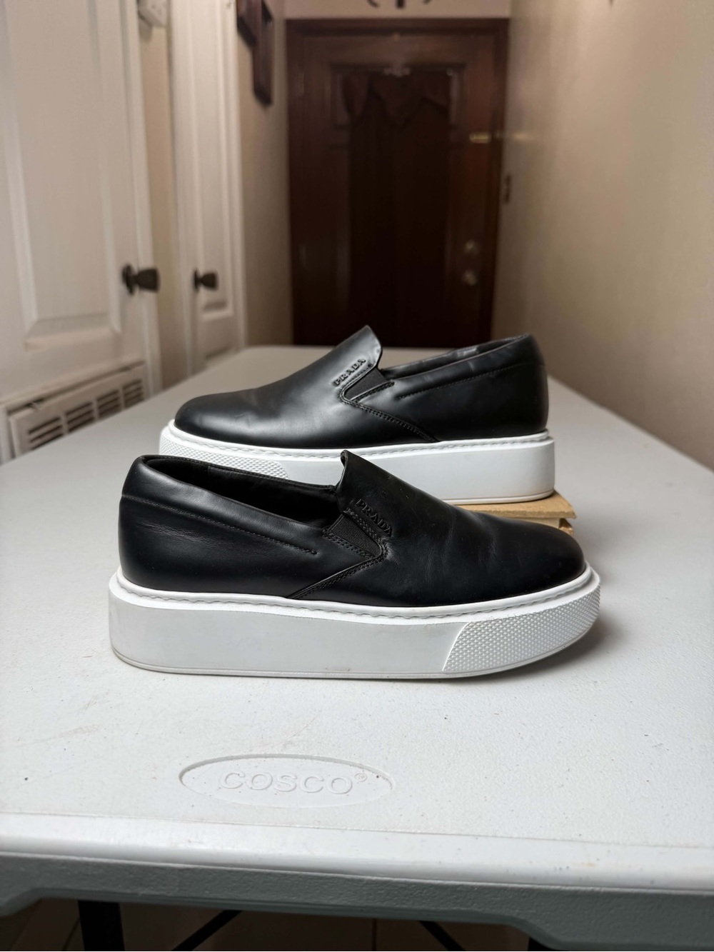 Prada slip-on shoes featuring a thick white platform Sz 35 / US 5